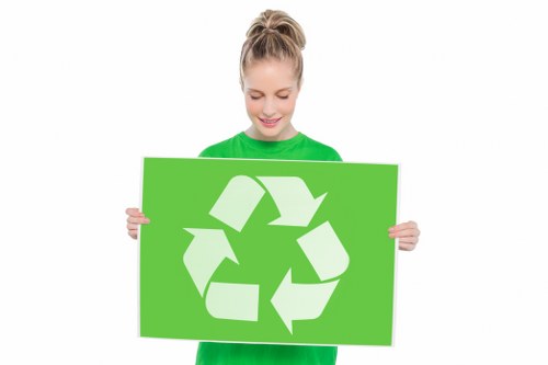 Waste materials being loaded into a skip